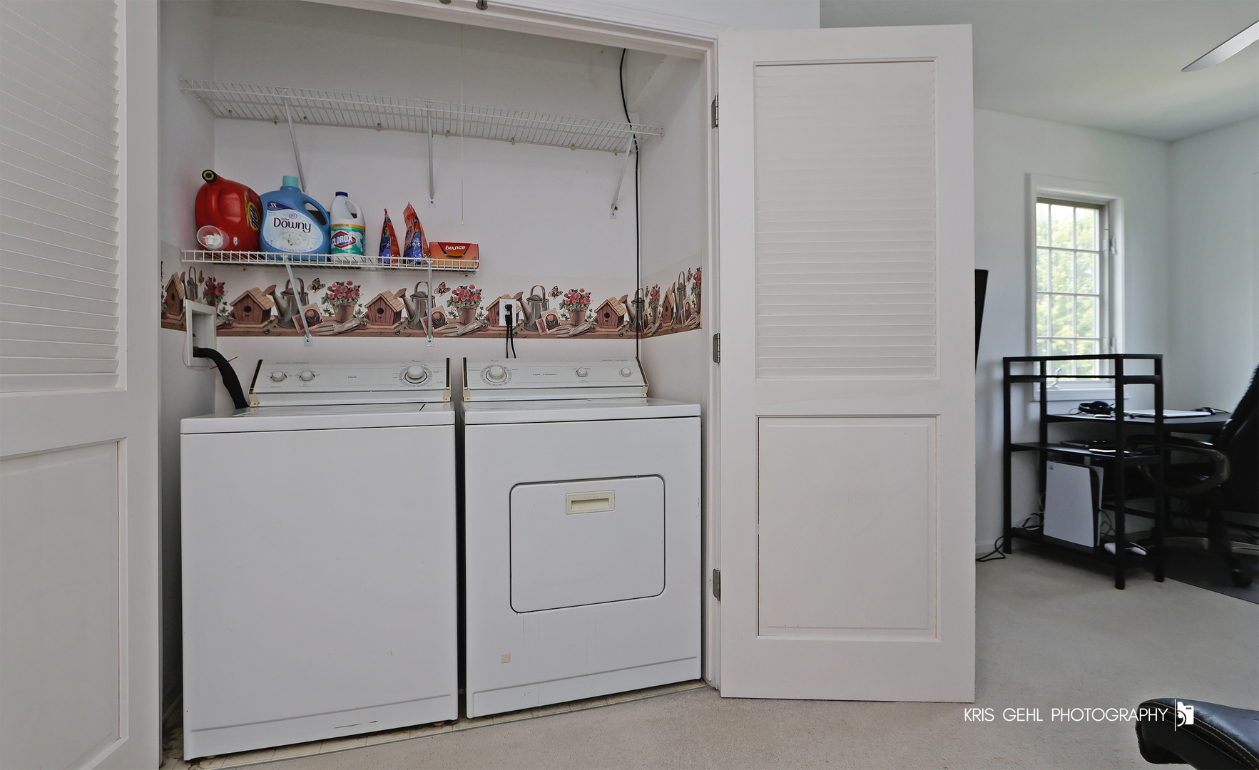 1277 Queen Ann Lane Gurnee, IL 60031 - Photo 19 of 25 a view of a hallway with washer and dryer