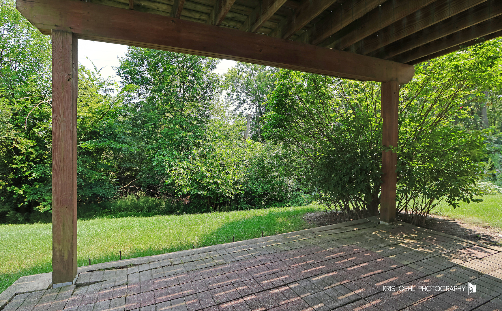 1277 Queen Ann Lane Gurnee, IL 60031 - Photo 24 of 25 a view of a porch with a yard