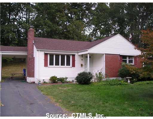 38 Westlook Road Wethersfield, CT 06109 - Photo 1 of 1 a front view of a house with a garden