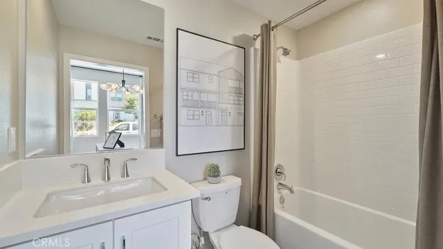 a view of washer and dryer with kitchen countertop