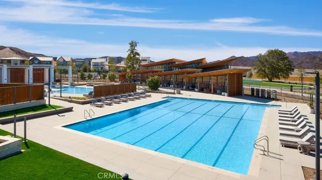 a view of a balcony with a patio