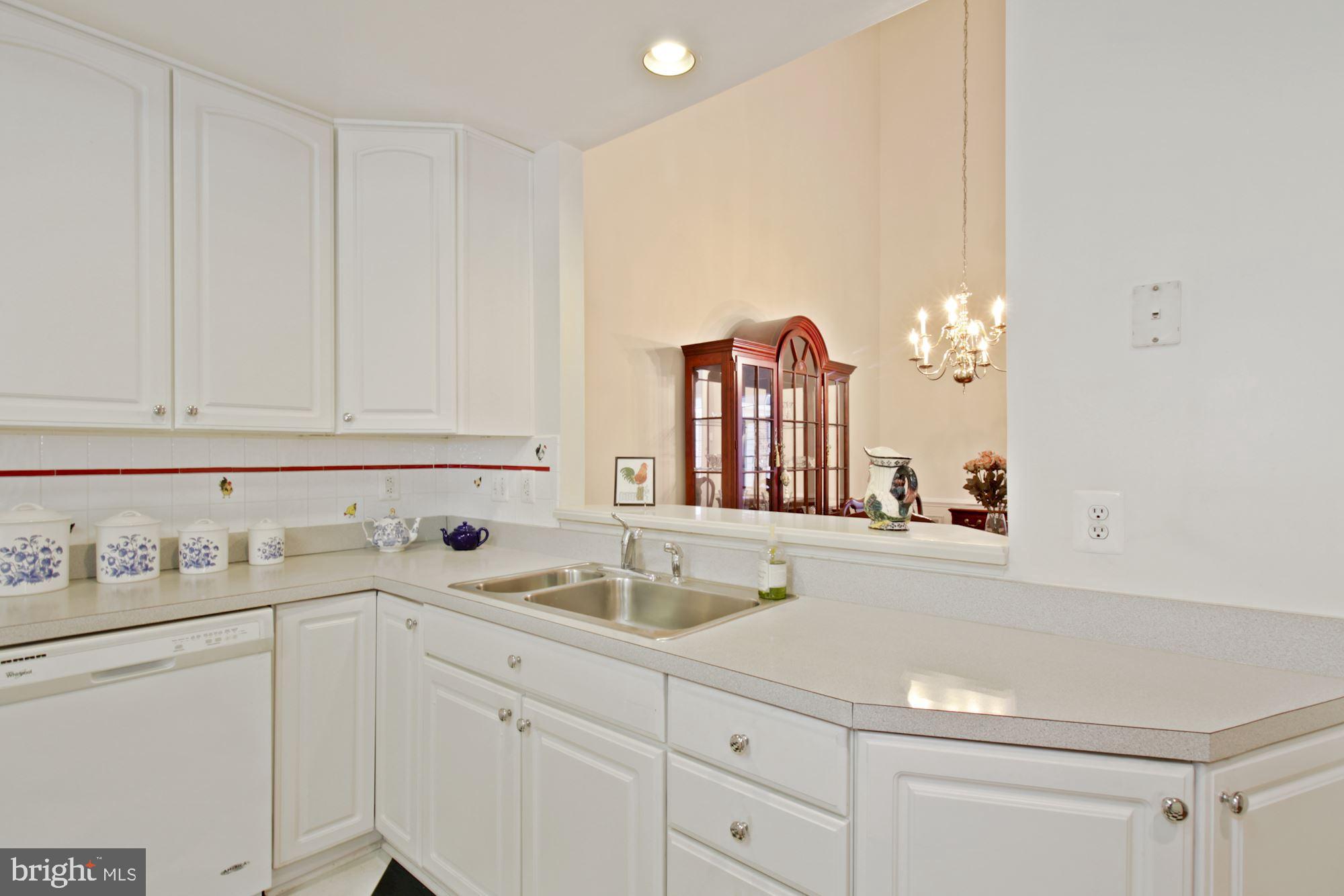 342 Colony Point Place Edgewater, MD 21037 - Photo 15 of 41 View from Kitchen into Dining Room