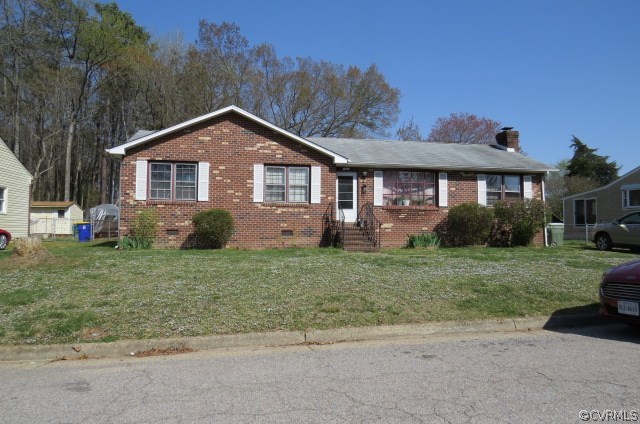 front view of a house with a yard