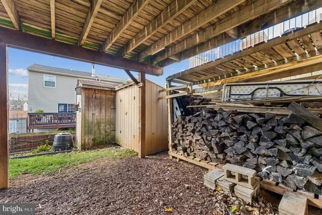 a view of room with wooden floor
