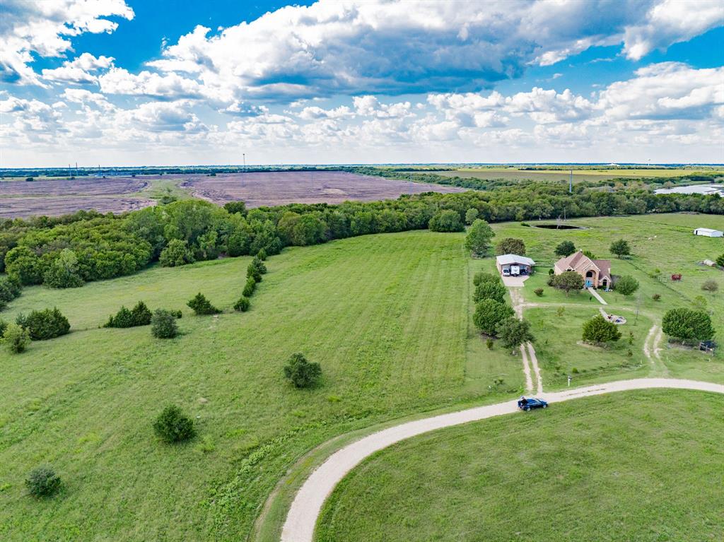 8 Thornhill Road Greenville, TX 75401 - Photo 16 of 17 a view of a garden with a lake view