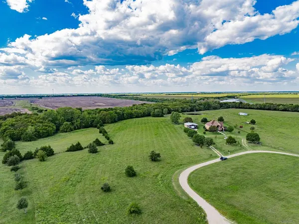 a view of a golf course with a lake