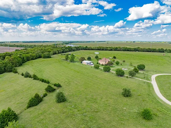 a view of a lake with a houses