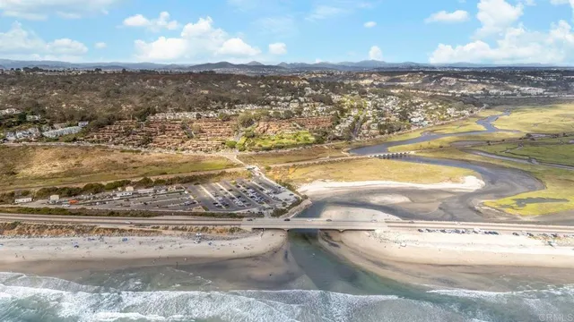 a view of ocean and mountain