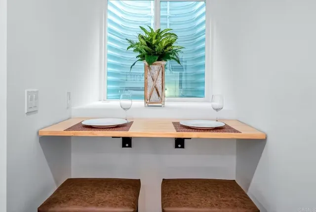 a room with table and window