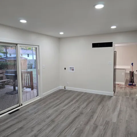 en empty room with windows