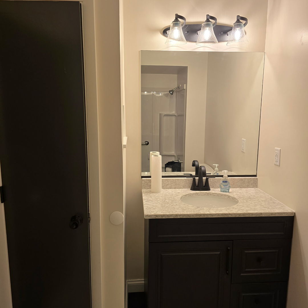 1103 Westview Drive Normal, IL 61761 - Photo 13 of 30 a bathroom with a sink and a mirror