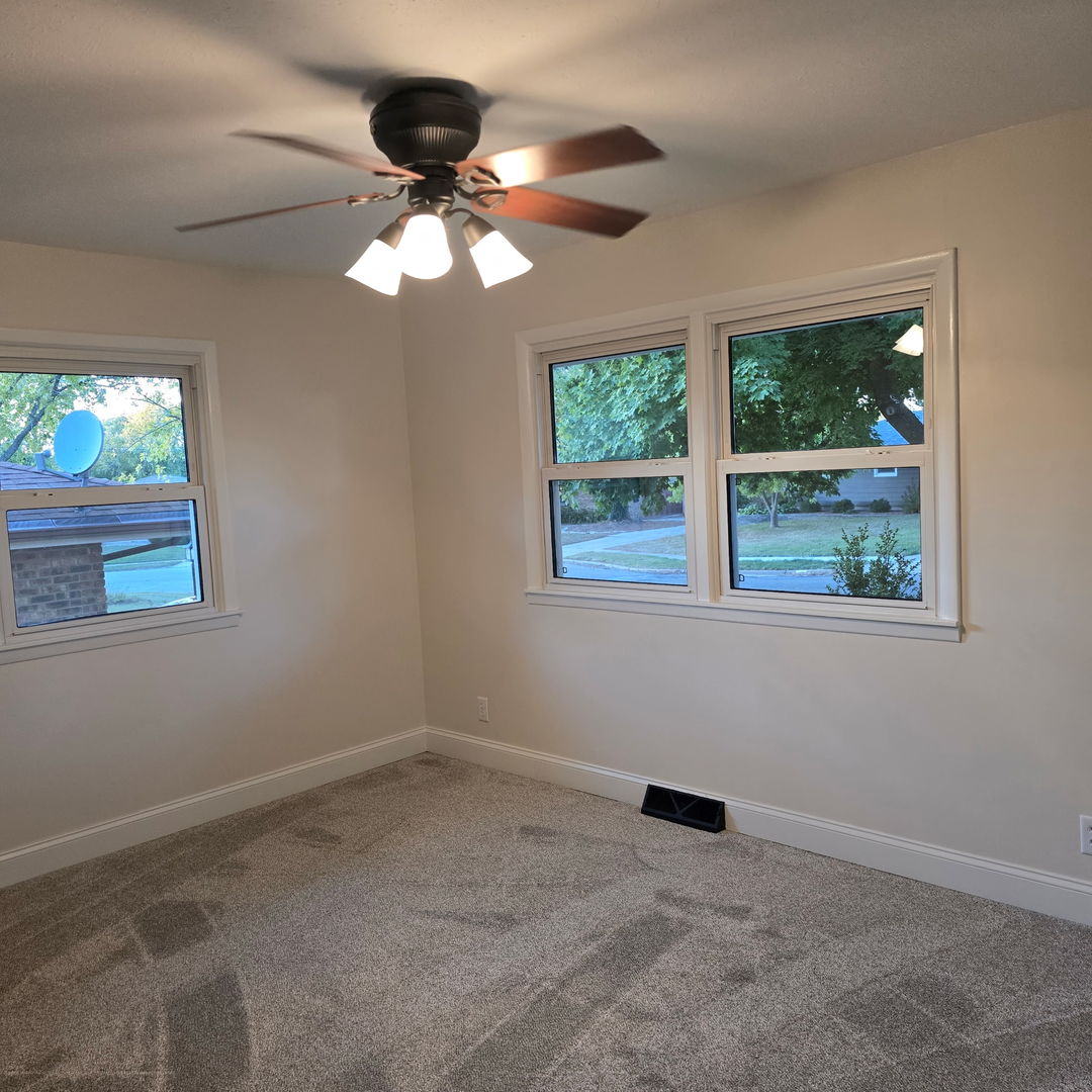 1103 Westview Drive Normal, IL 61761 - Photo 14 of 30 a view of room with window and ceiling fan