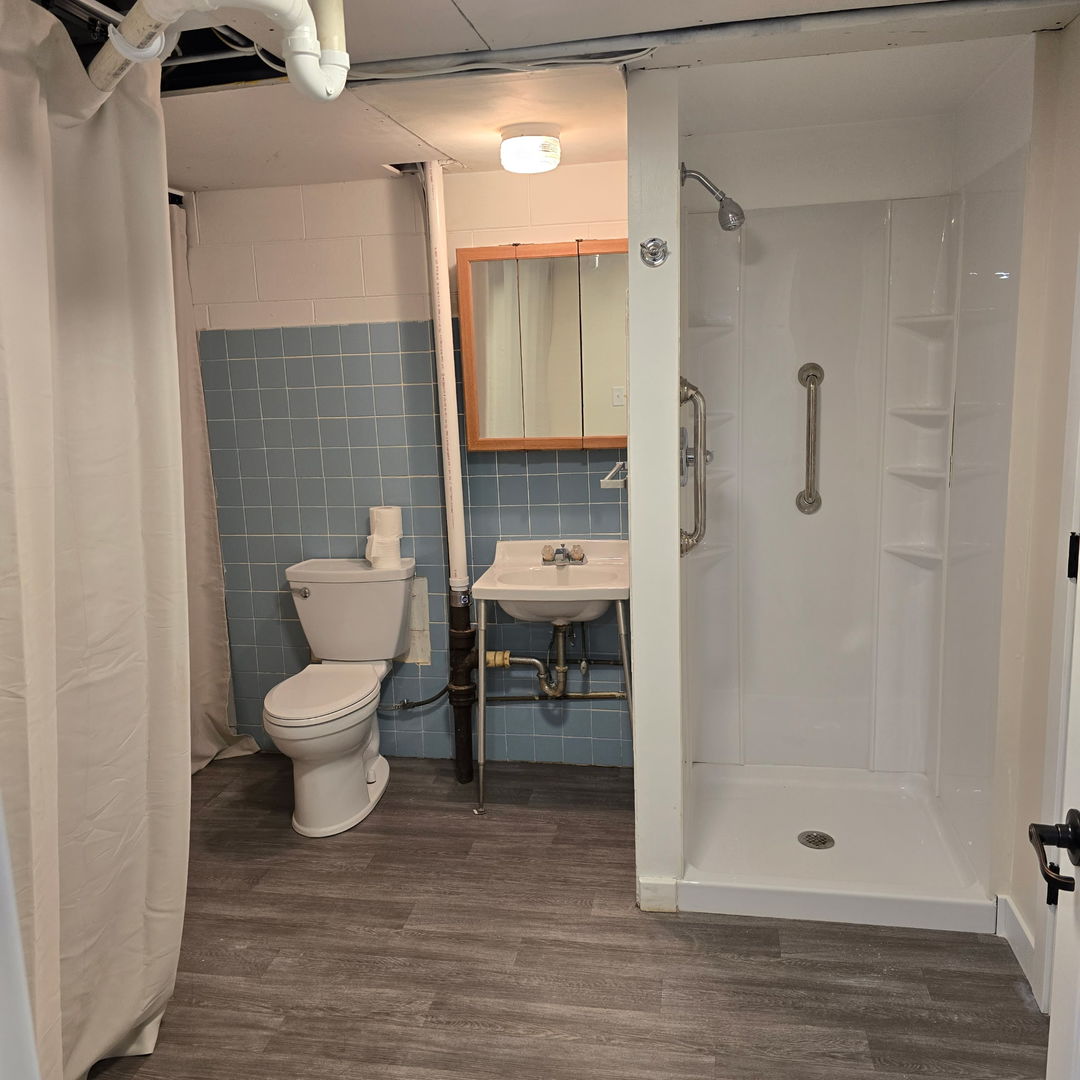 1103 Westview Drive Normal, IL 61761 - Photo 22 of 30 a bathroom with a toilet and a shower