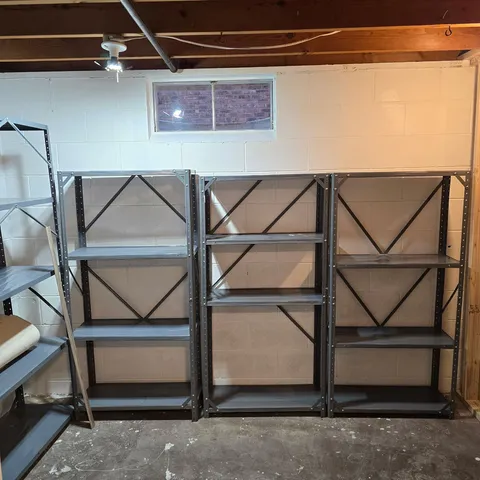 a view of roof deck with chair and wooden floor