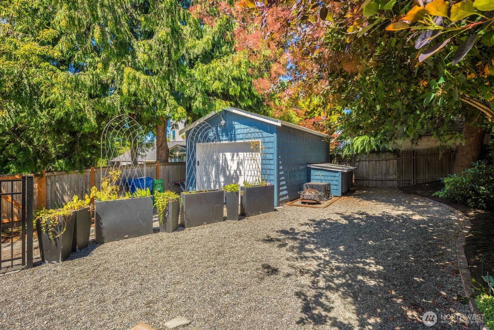 1624 North 50th Street, Unit B Seattle, WA 98103 - Photo 15 of 18 a view of a house with backyard and sitting area