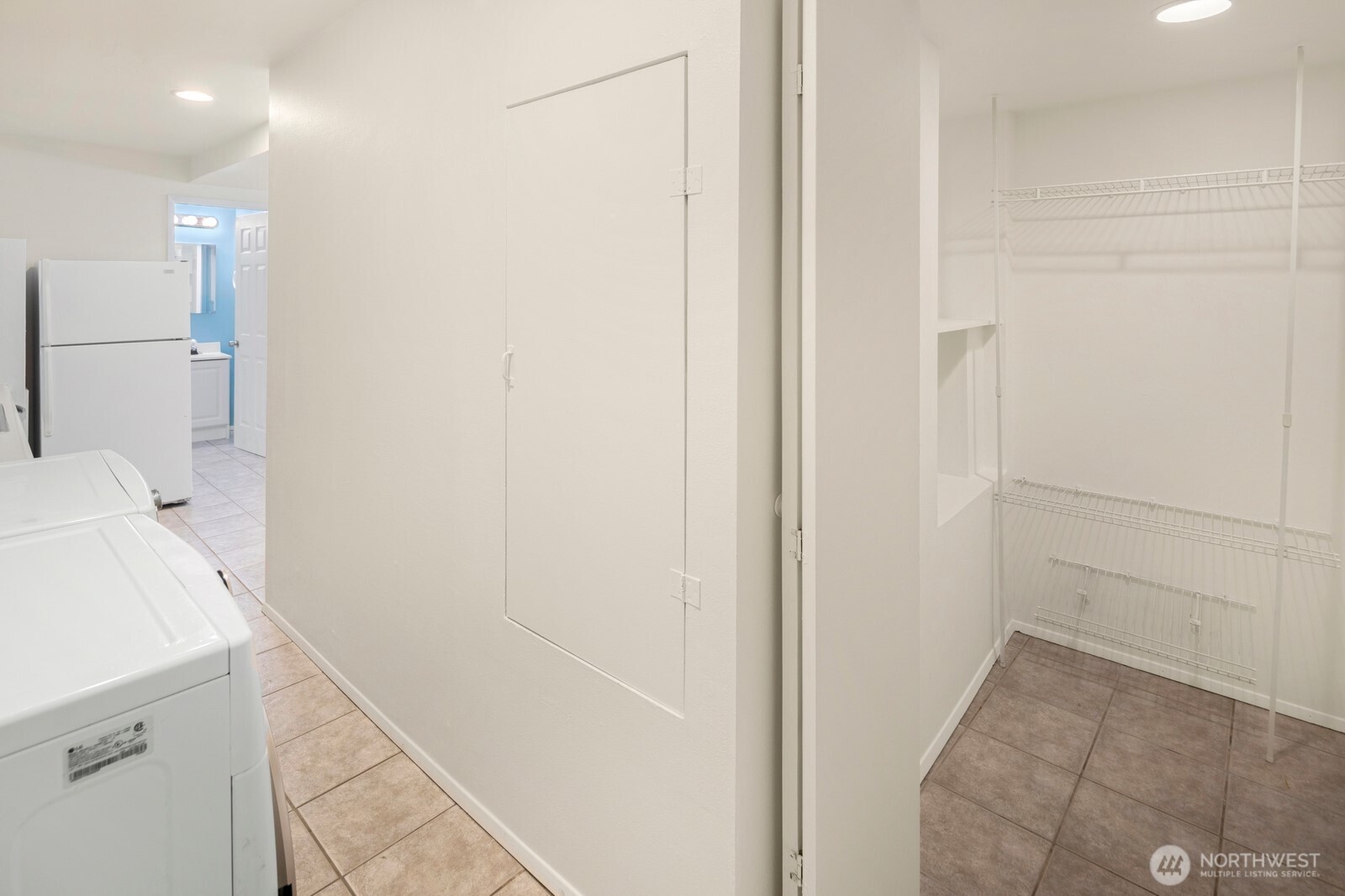 1624 North 50th Street, Unit B Seattle, WA 98103 - Photo 4 of 18 a bathroom with a sink and shower