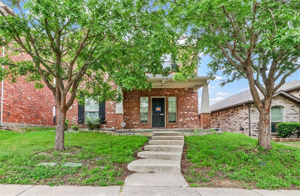 5417 Beacon Lane McKinney, TX 75071 - Photo 1 of 1 Obstructed view of property featuring covered porch, a front lawn, and brick siding