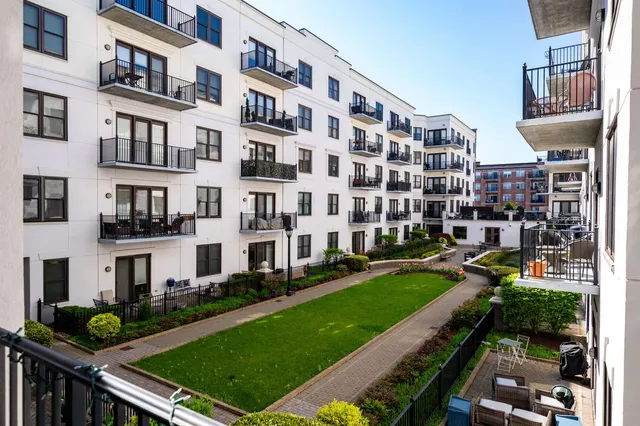 front view of a building with a yard