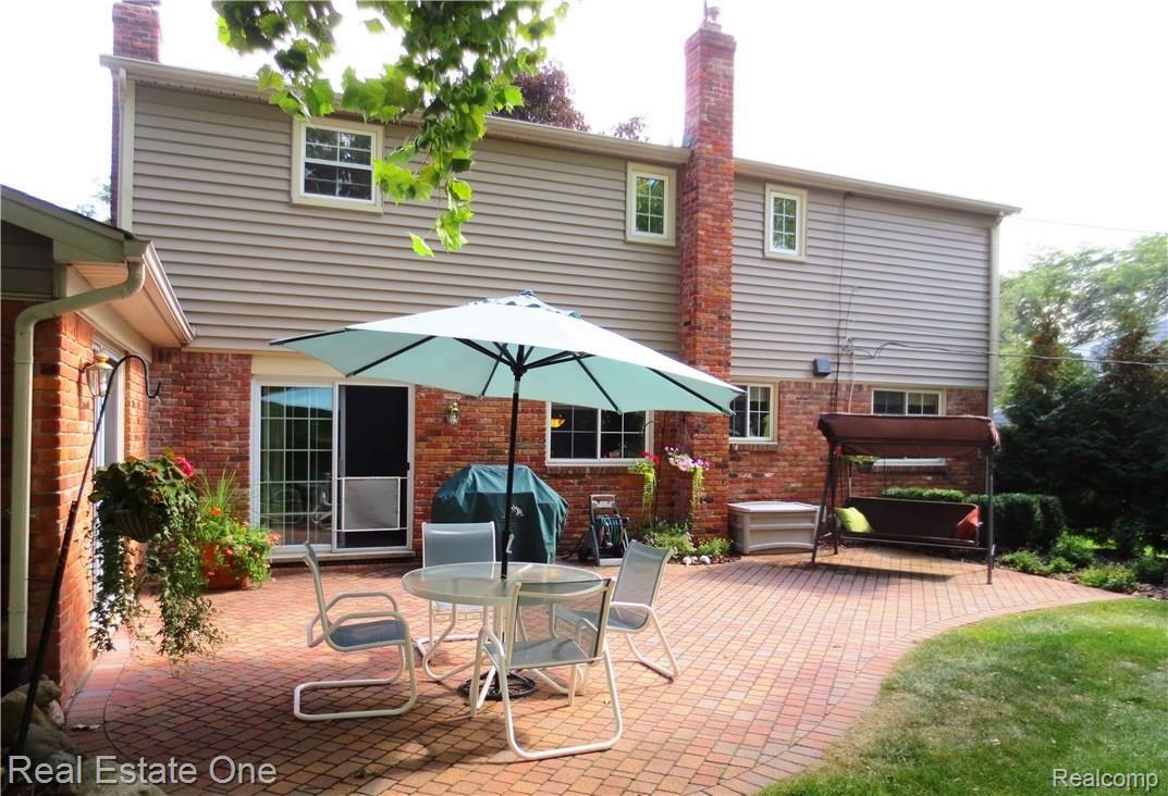 764 Spartan Drive Rochester, MI 48309 - Photo 7 of 50 Serene brick paver patio, barbeque, swing and storage box stays