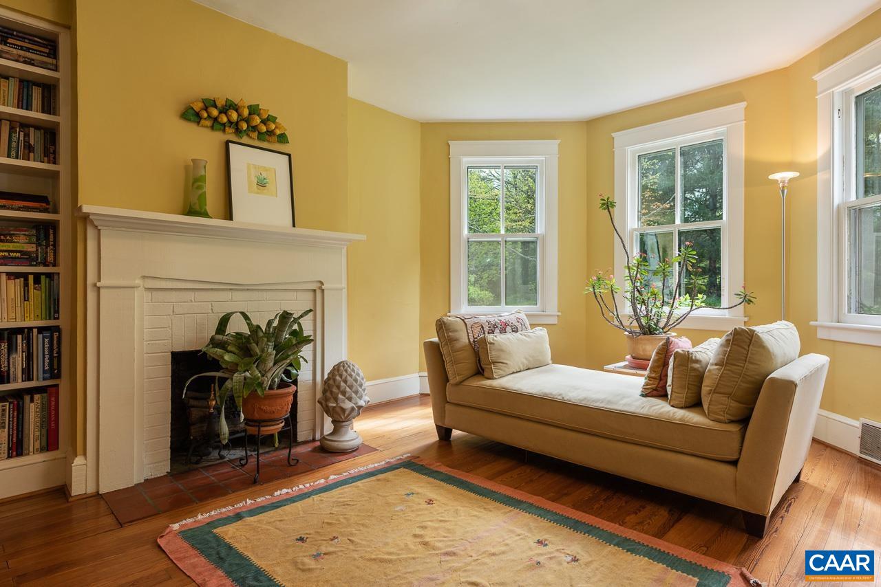 3944 Stony Point Road Keswick, VA 22947 - Photo 7 of 45 a living room with furniture and a fireplace