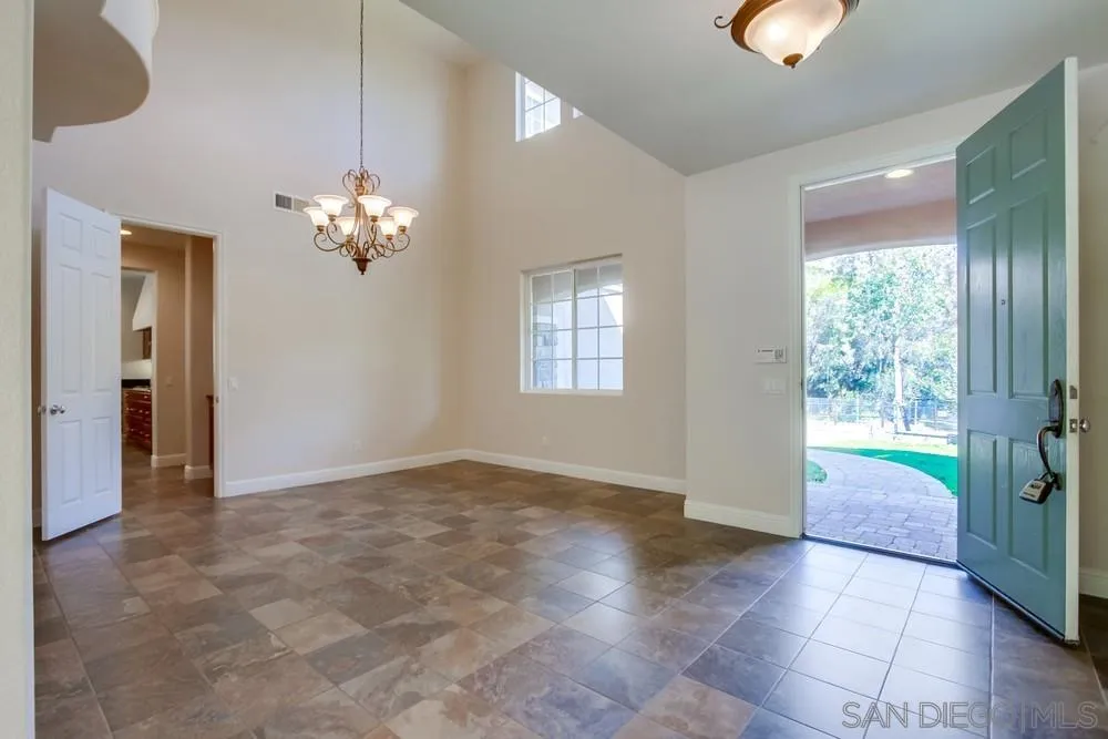 11674 Creek Road Poway, CA 92064 - Photo 15 of 70 wooden floor in an empty room with a window