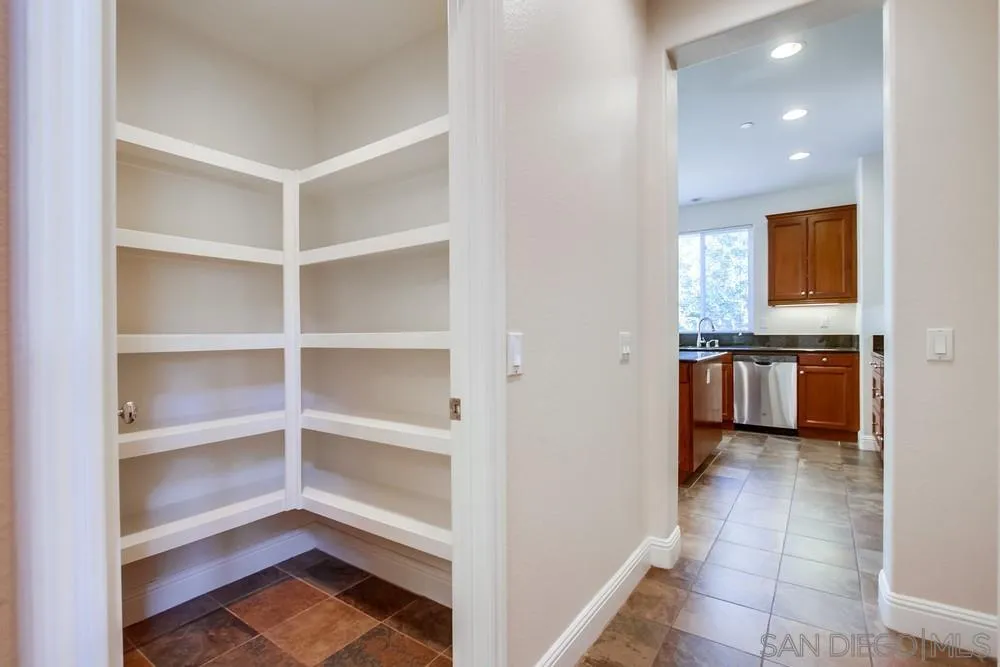 11674 Creek Road Poway, CA 92064 - Photo 24 of 70 a view of a kitchen with a sink and a window
