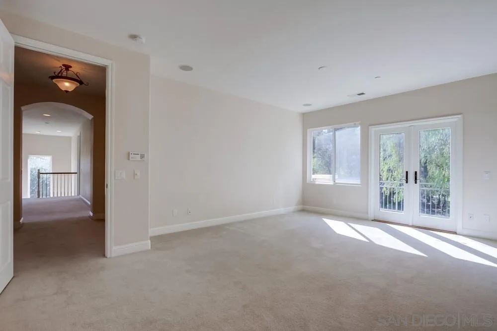 11674 Creek Road Poway, CA 92064 - Photo 27 of 70 a view of livingroom with furniture and window
