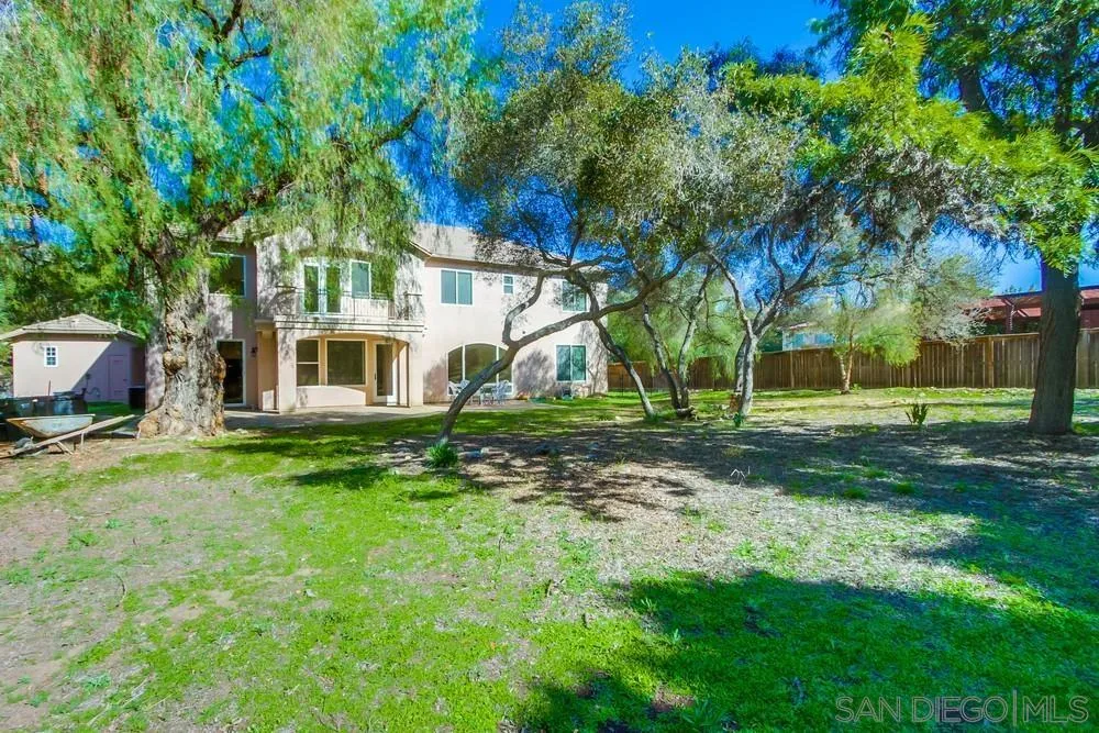 11674 Creek Road Poway, CA 92064 - Photo 55 of 70 a view of a house with a backyard