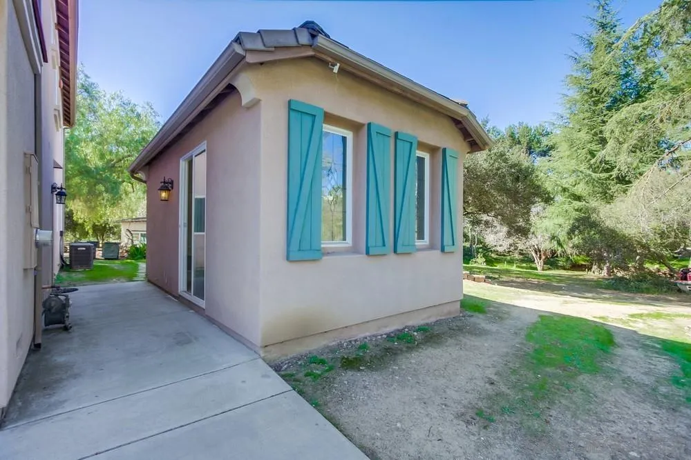 11674 Creek Road Poway, CA 92064 - Photo 64 of 70 a view of a house with backyard and trees