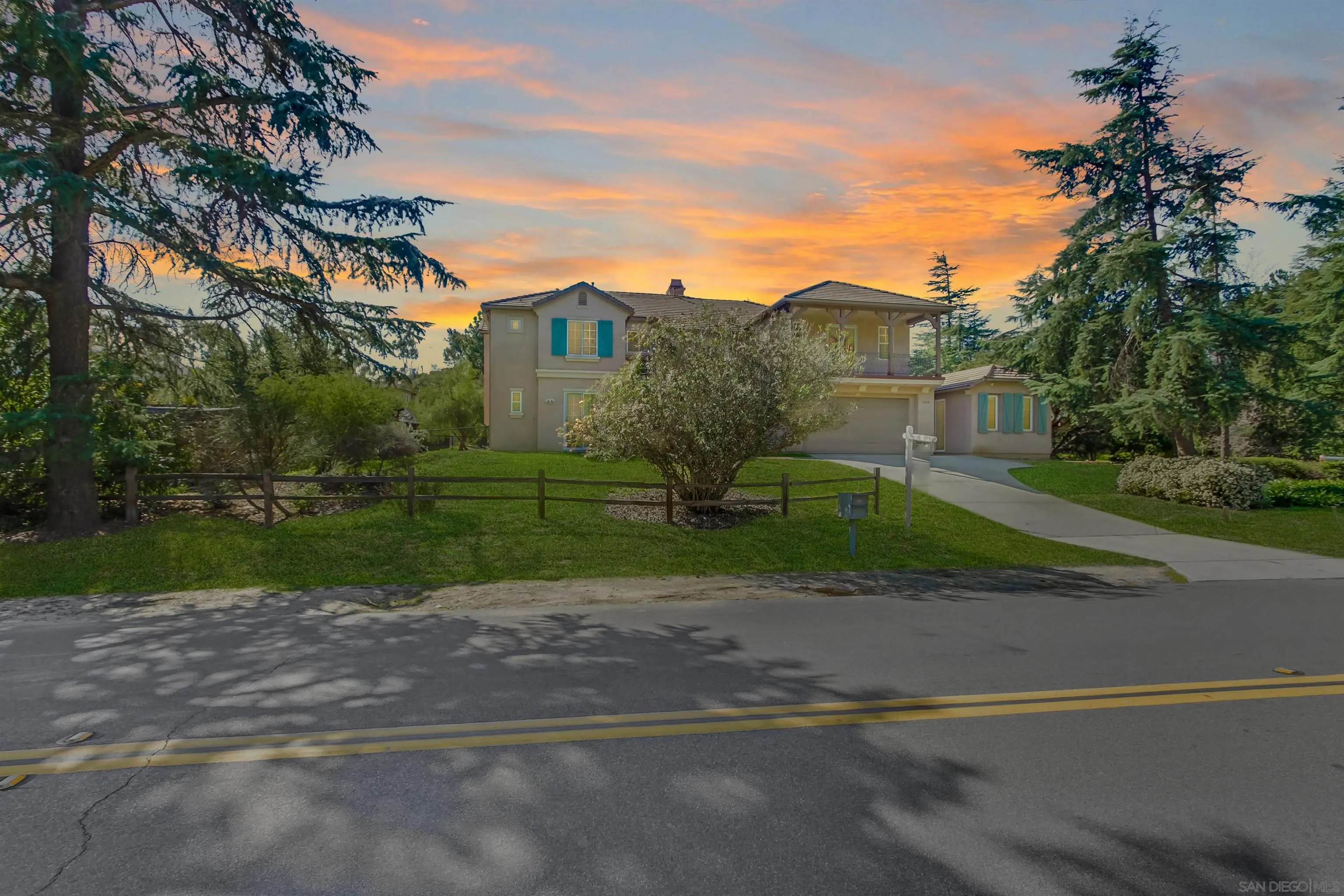 11674 Creek Road Poway, CA 92064 - Photo 9 of 70 a view of a house with a yard