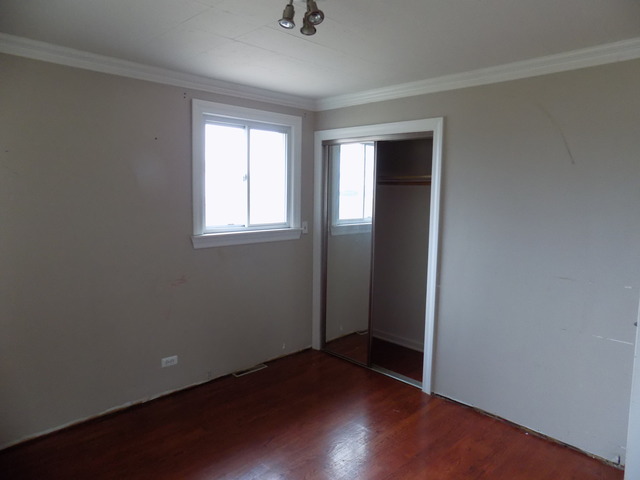 3N270 Rohlwing Road Addison, IL 60101 - Photo 8 of 13 an empty room with a window