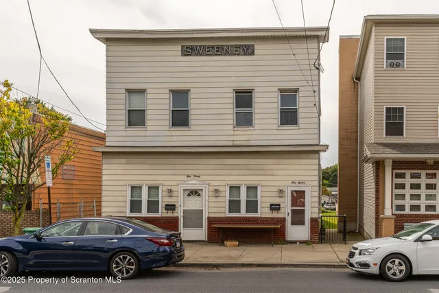 a car parked in front of a building