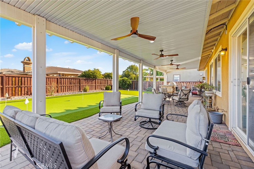 28386 Fox Ridge Cove Menifee, CA 92585 - Photo 30 of 48 a view of a swimming pool with a patio