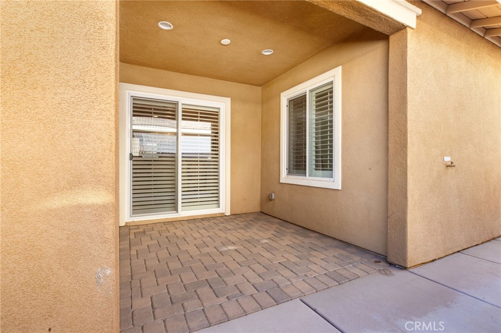 28386 Fox Ridge Cove Menifee, CA 92585 - Photo 40 of 48 a view of an empty room with a window