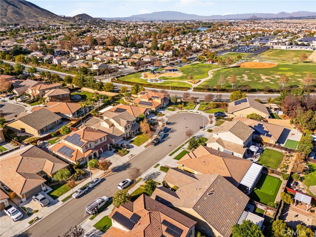 28386 Fox Ridge Cove Menifee, CA 92585 - Photo 46 of 48 an aerial view of residential building with parking space