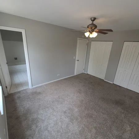 a bathroom with a sink a toilet and bathtub