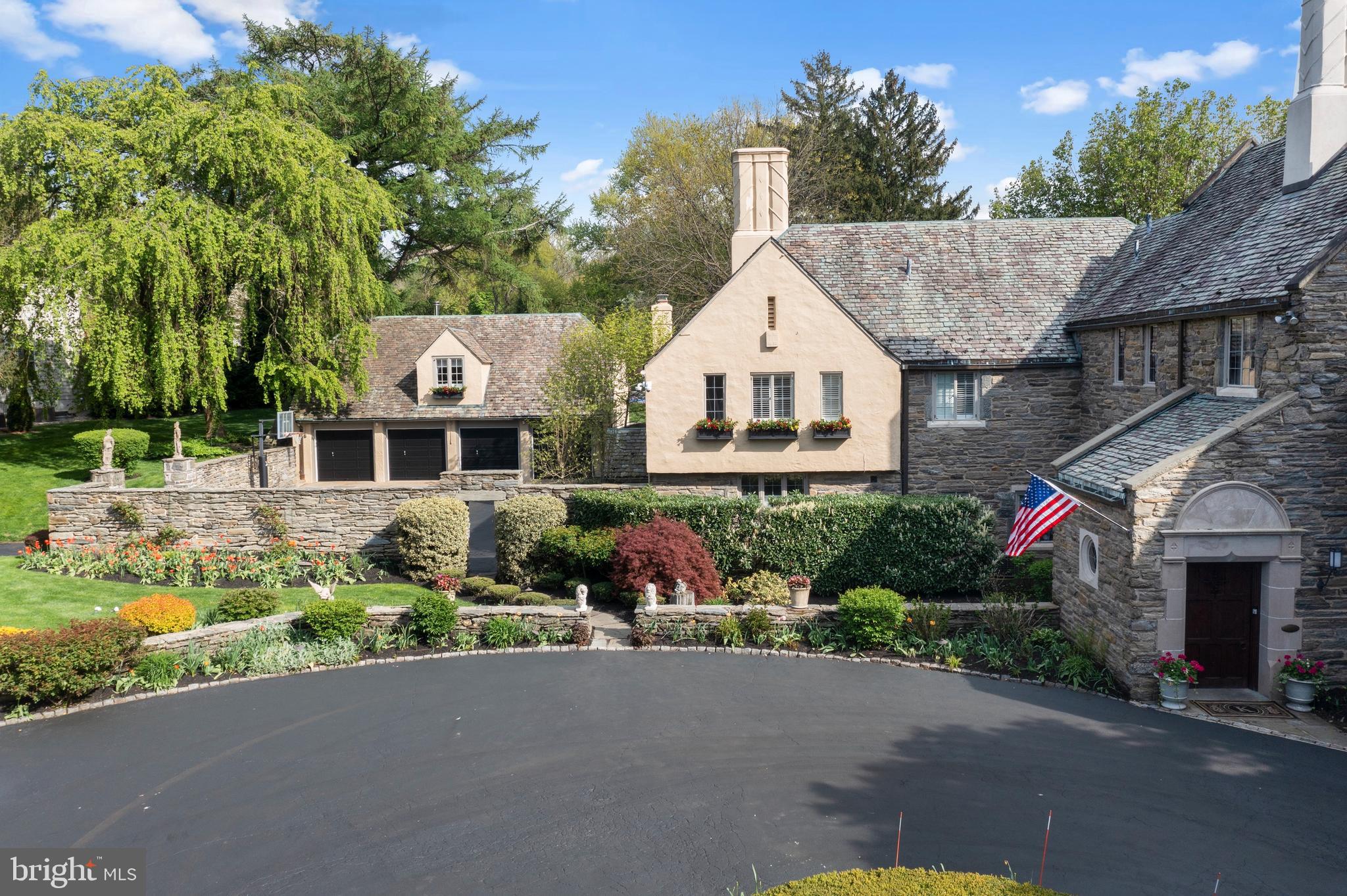 209 Tower Road Villanova, PA 19085 - Photo 14 of 110 view on right of 4 car garage with apartment above
