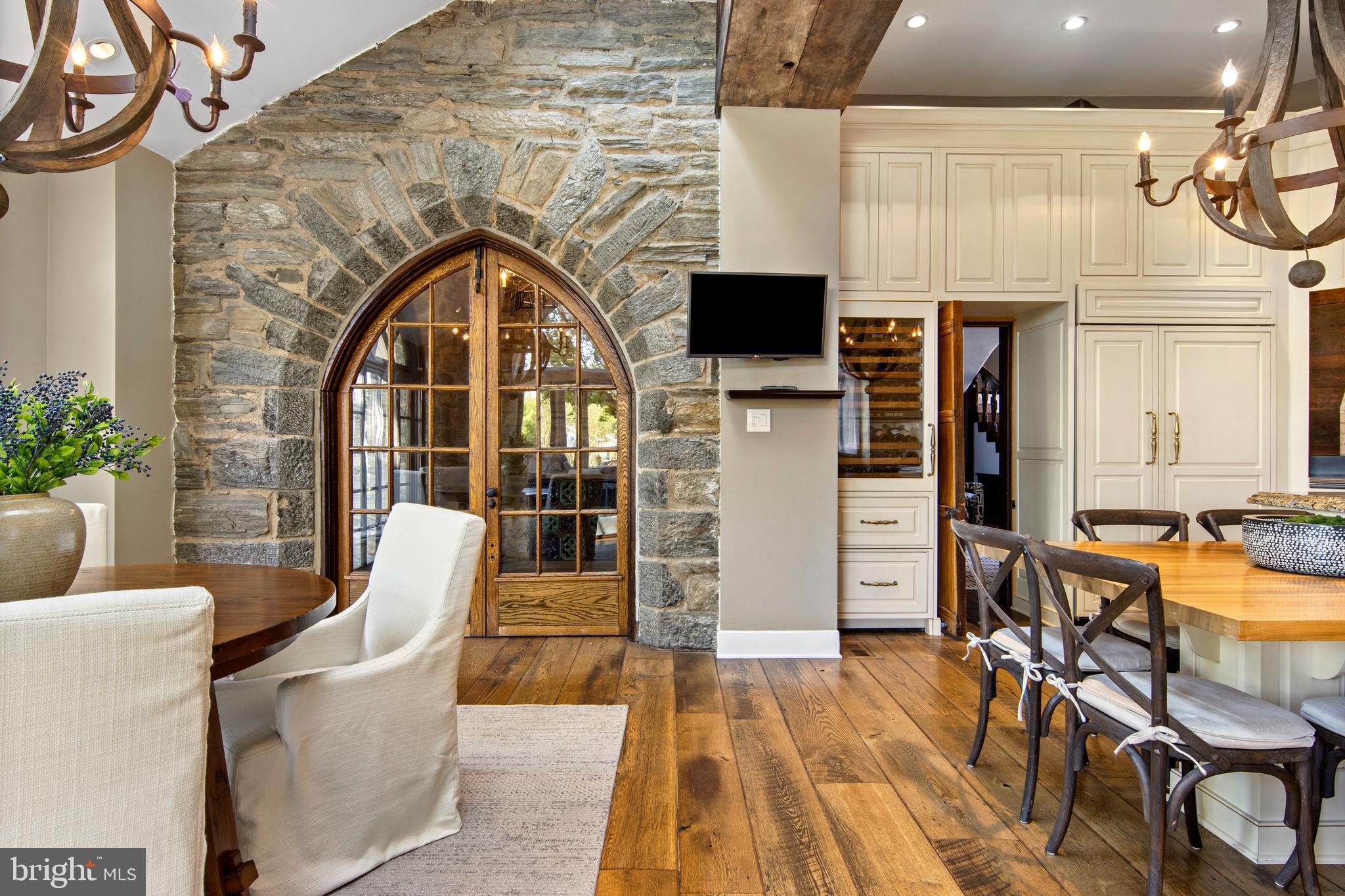 209 Tower Road Villanova, PA 19085 - Photo 39 of 110 Arched doors lead to loggia and covered patio