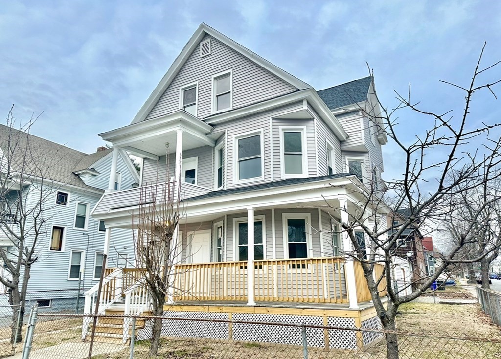 28-30 Kendall Street Springfield, MA 01104 - Photo 1 of 10 a front view of a house with a yard