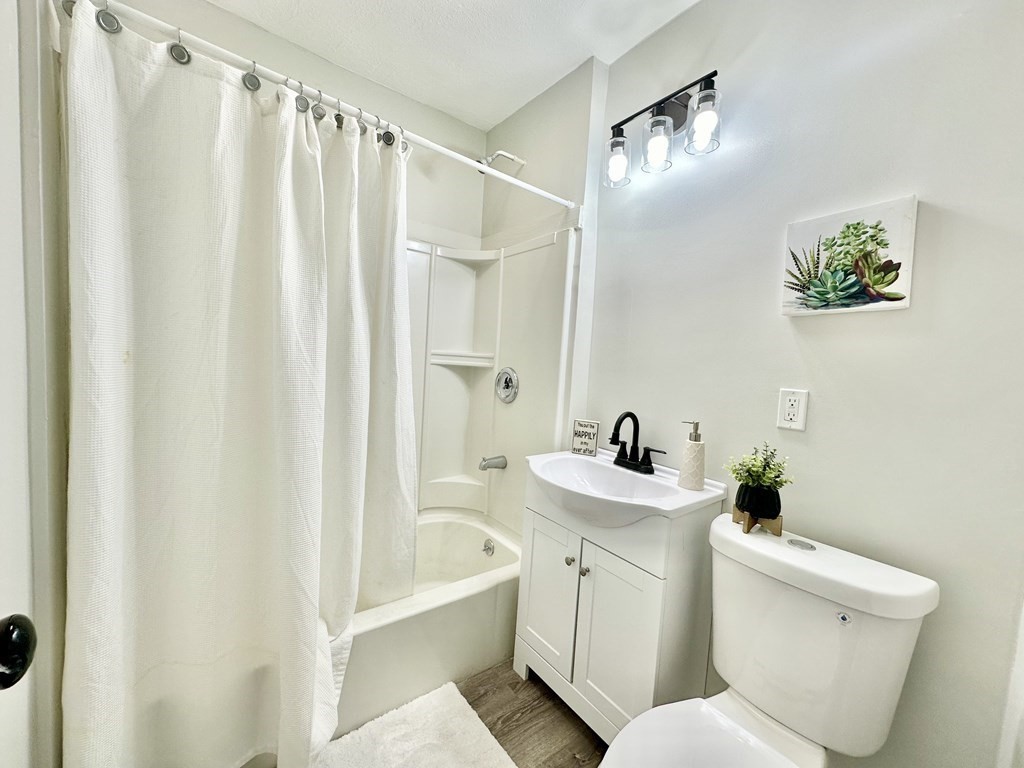 28-30 Kendall Street Springfield, MA 01104 - Photo 5 of 10 a bathroom with a sink toilet and shower