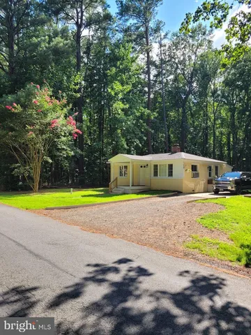 a view of a house with a swimming pool