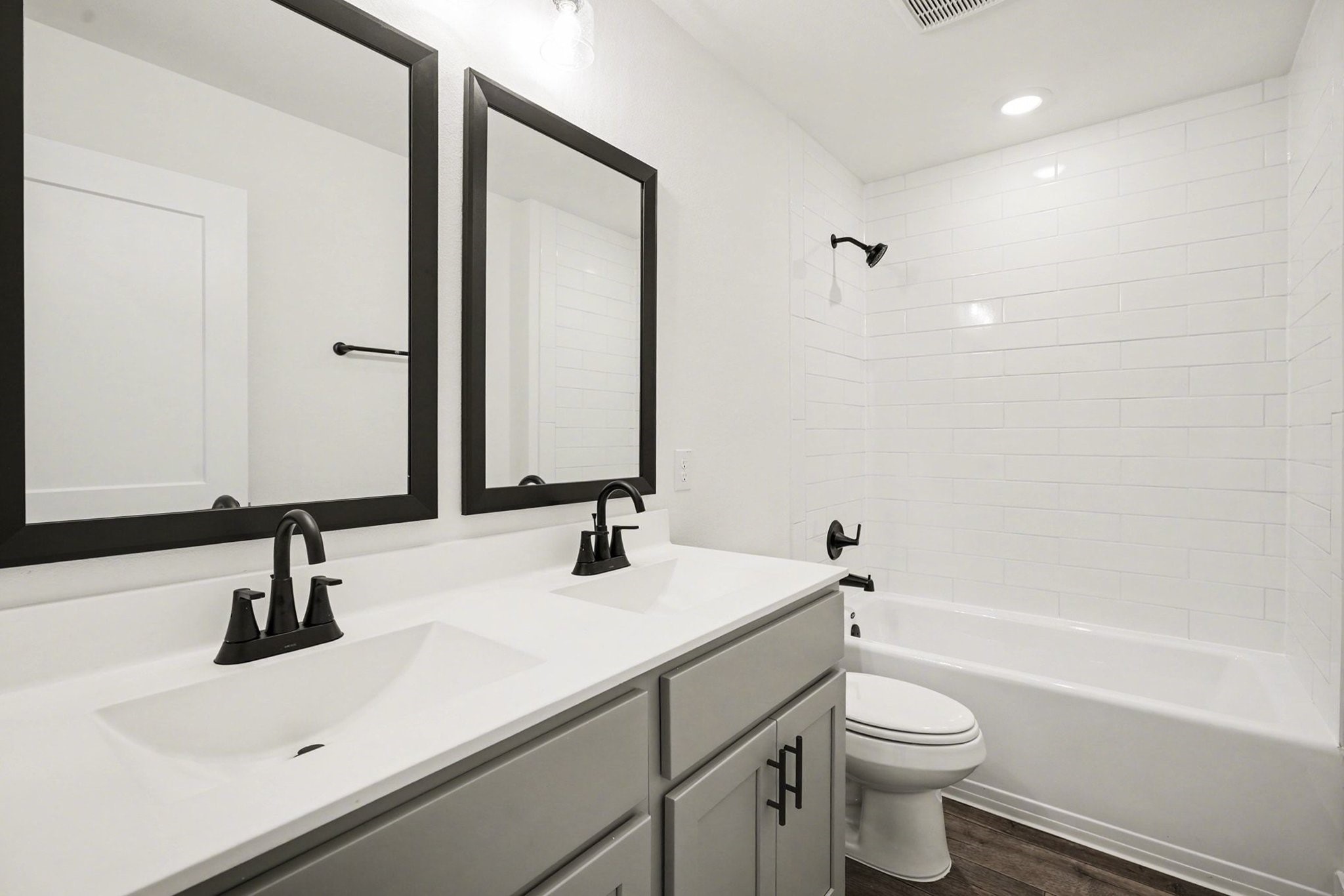 1 Keystone Court Angleton, TX 77515 - Photo 16 of 26 a bathroom with a sink and a mirror
