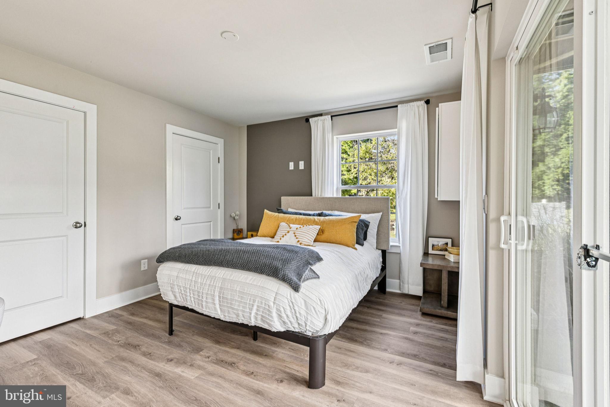 1818 Blythe Way Winchester, VA 22601 - Photo 22 of 45 a bed sitting in a spacious bedroom next to a window