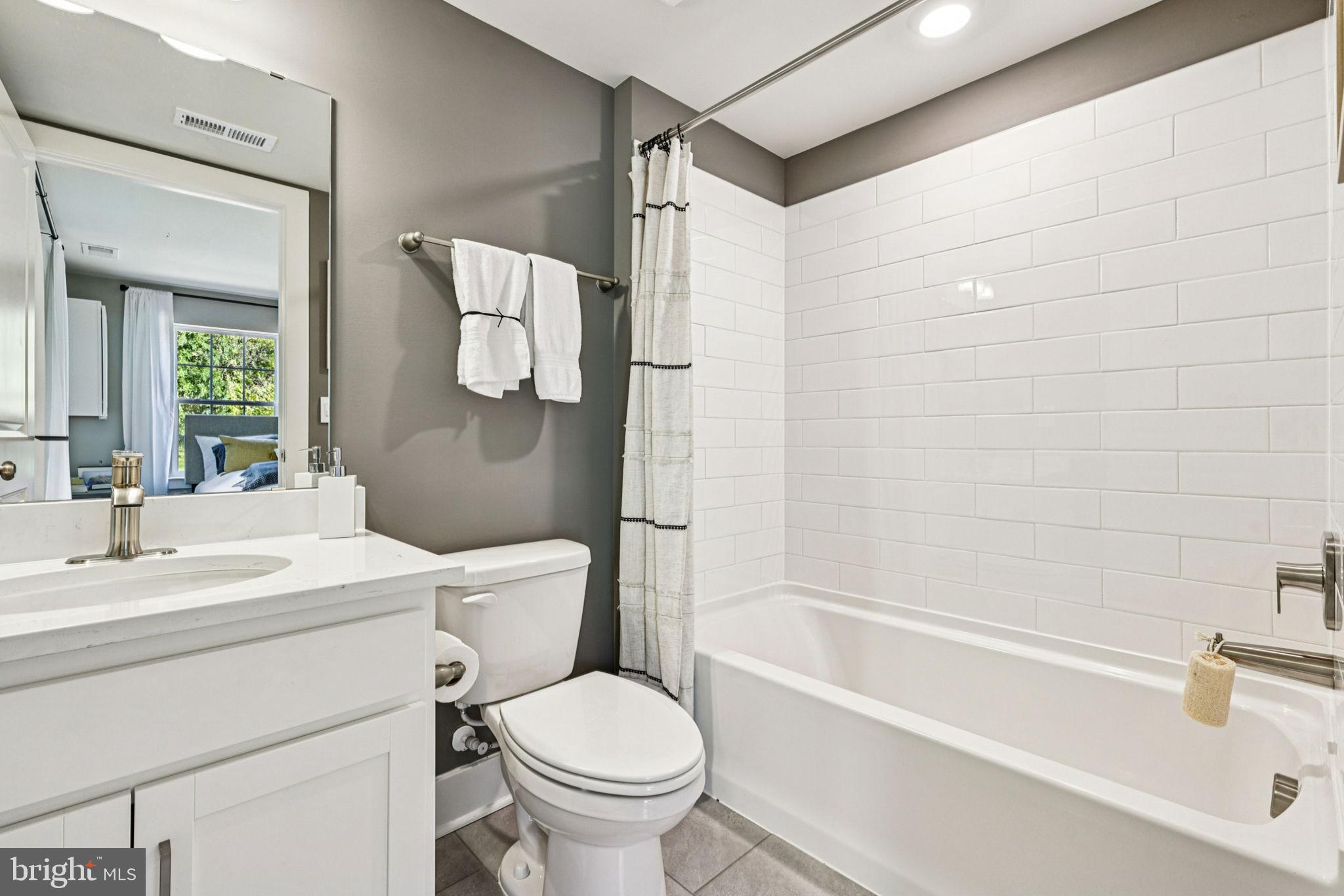 1818 Blythe Way Winchester, VA 22601 - Photo 24 of 45 a bathroom with a sink toilet and shower