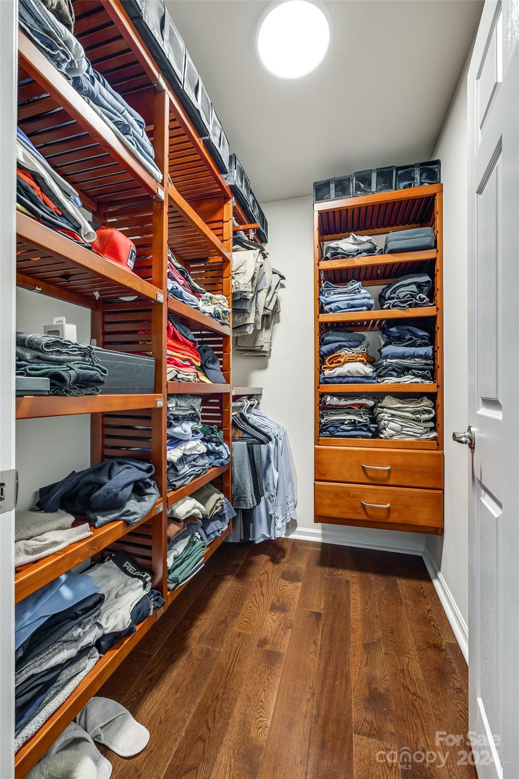 127 Inlet Point Drive Fort Mill, SC 29708 - Photo 18 of 46 a view of walk in closet with clothes and shoes