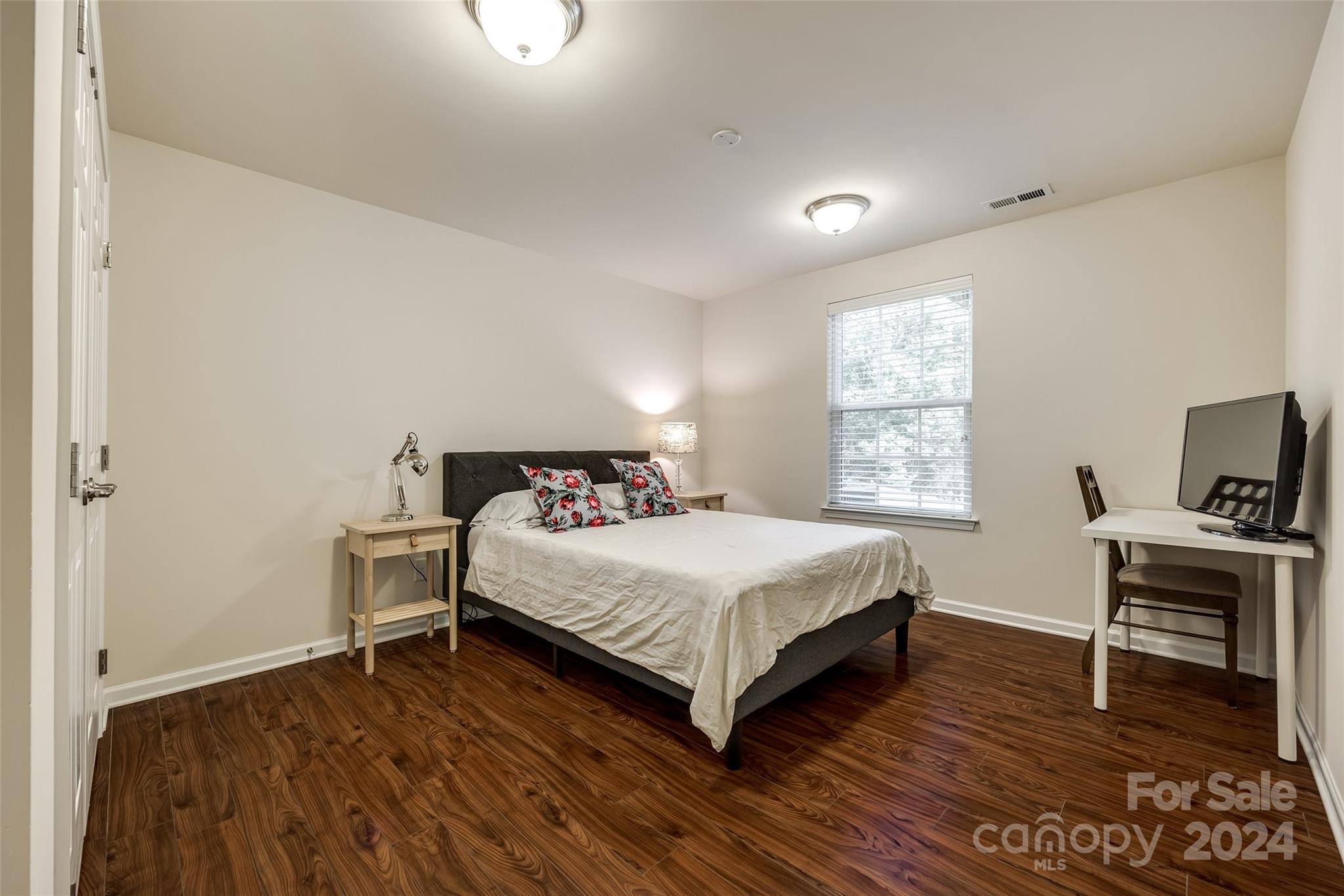 127 Inlet Point Drive Fort Mill, SC 29708 - Photo 23 of 46 a bedroom with a bed and a window