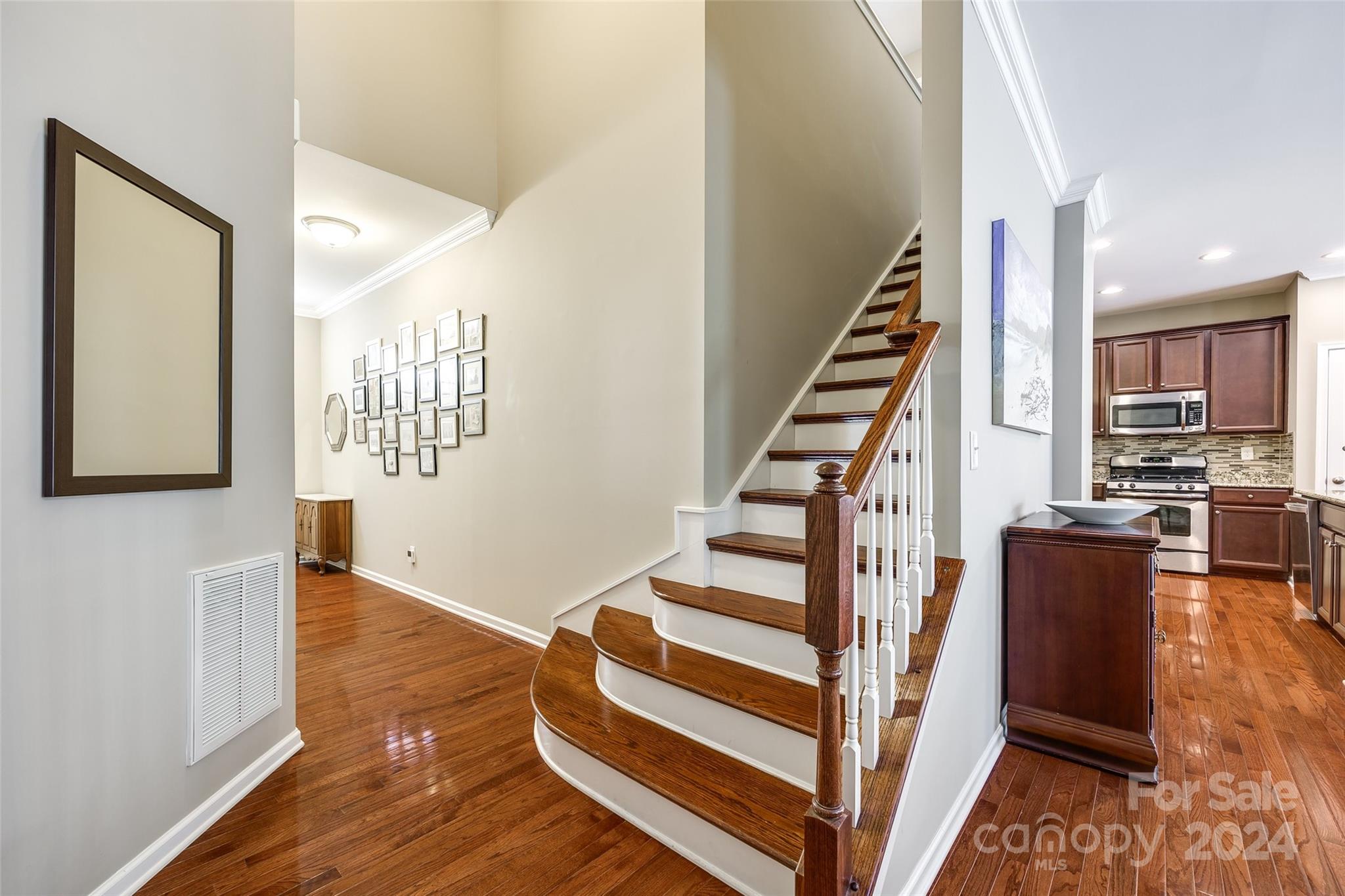 127 Inlet Point Drive Fort Mill, SC 29708 - Photo 3 of 46 a view of entryway and hall with wooden floor