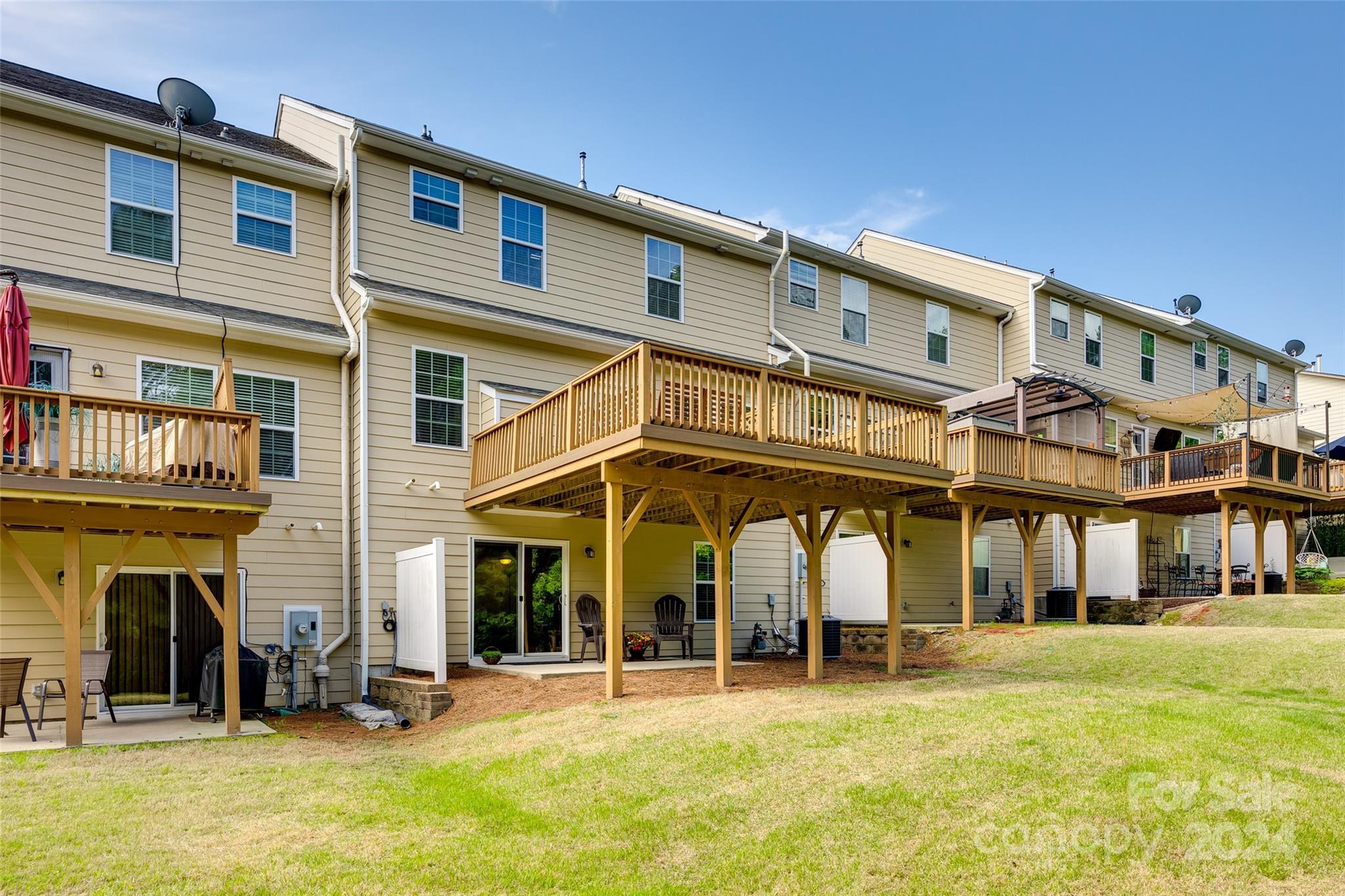 127 Inlet Point Drive Fort Mill, SC 29708 - Photo 32 of 46 a group of people sitting in front of a building
