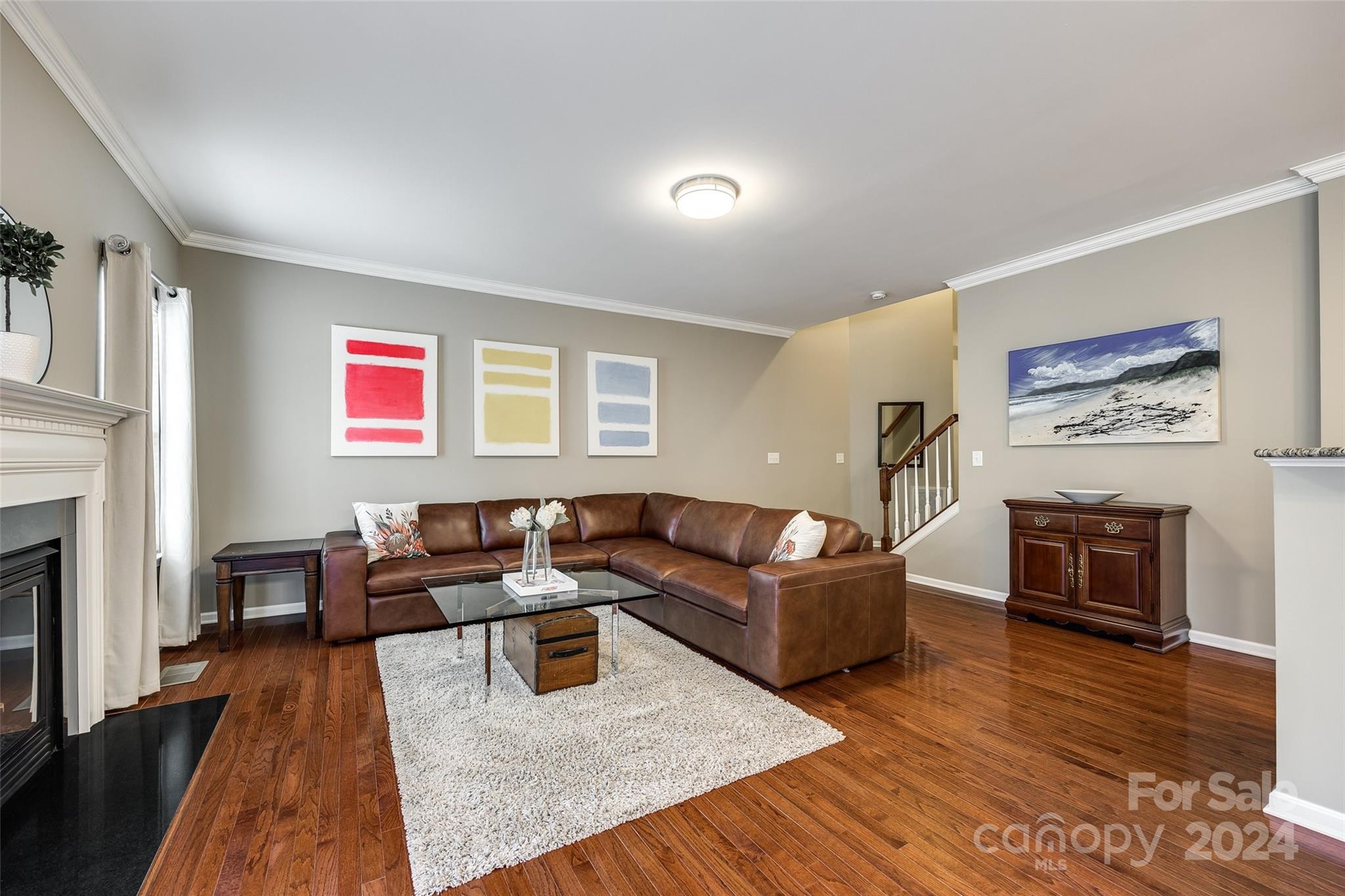 127 Inlet Point Drive Fort Mill, SC 29708 - Photo 5 of 46 a living room with furniture and a fireplace