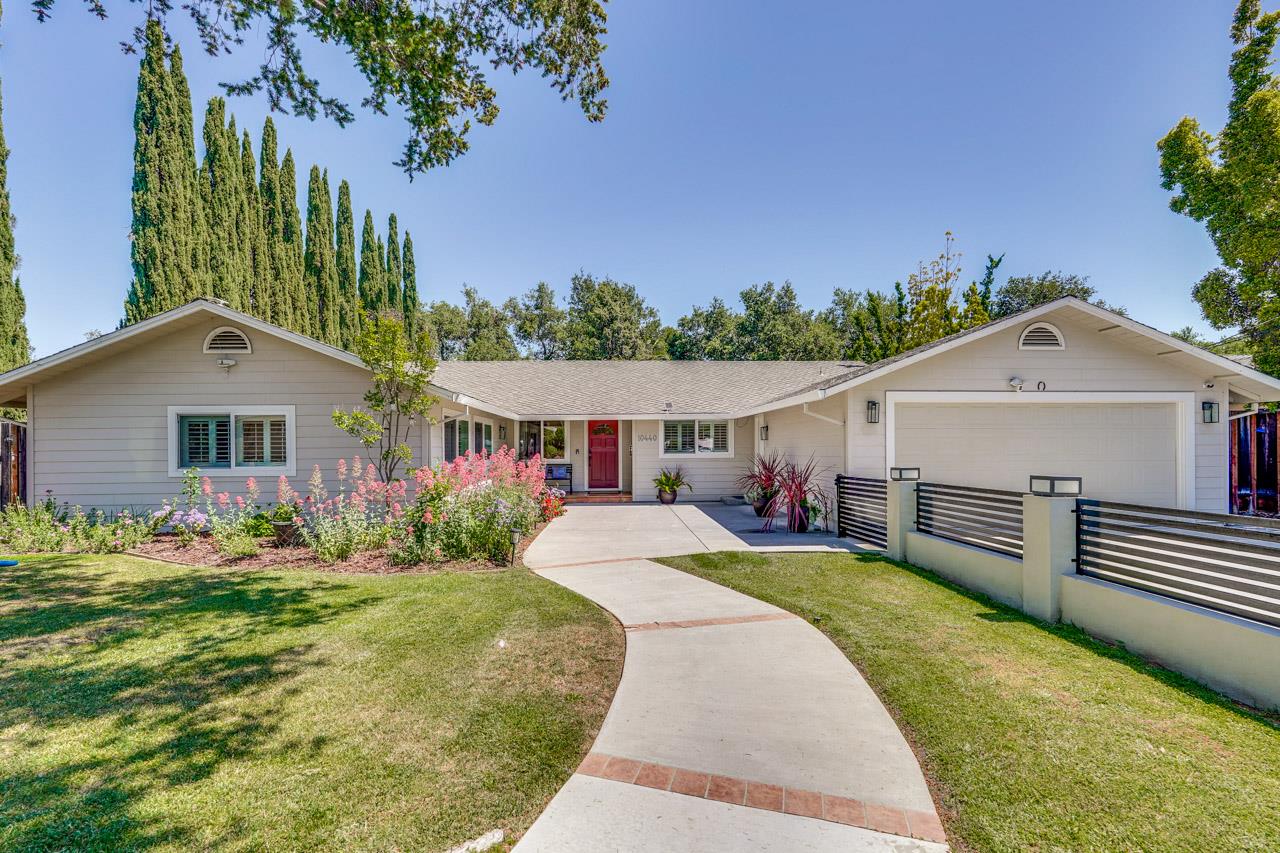 10440 Mann Drive Cupertino, CA 95014 - Photo 1 of 1 a front view of a house with a yard
